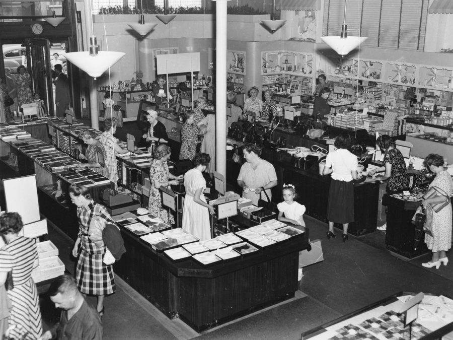 Employees in front of the J.J. Newberry department store in Tupper Lake