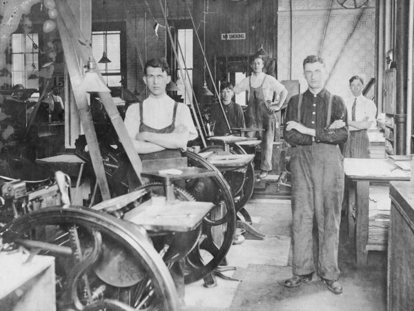 Five workers in the Morning Star print shop in Glens Falls