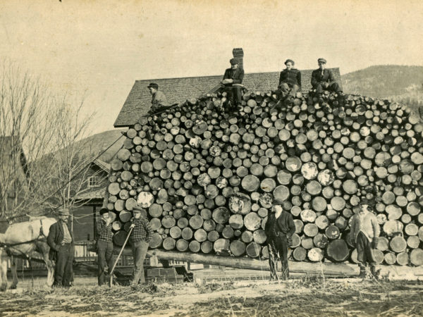 : Men with a load of logs in Keene Valley