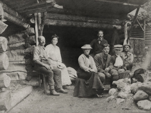 A group at a camp with guide near Keene Valley