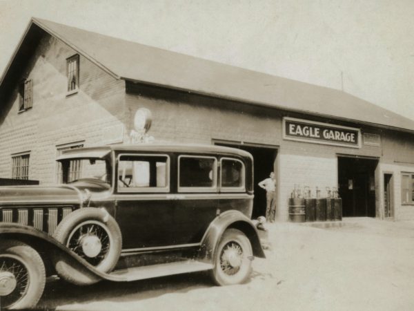 Mechanic outside the Eagle Garage in Keene Valley