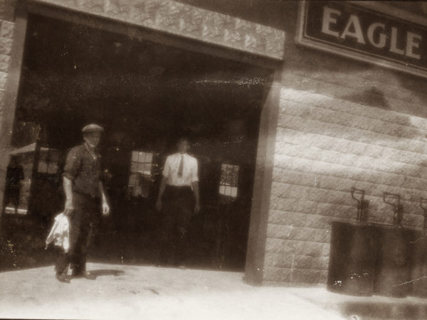 Two men working at the Eagle Garage in Keene Valley