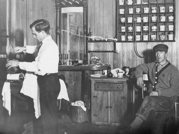 Bert Tyron in his barber shop in Keene Valley