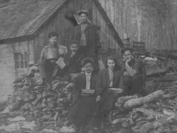 A group gathered at Charles Beedes’ sugar camp in Keene Valley