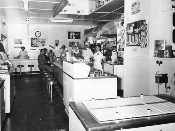 Employees and customers in Altamont Dairy Bar in Saranac Lake