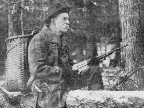 Captain E.E. Thomas hunting with an Adirondack pack basket