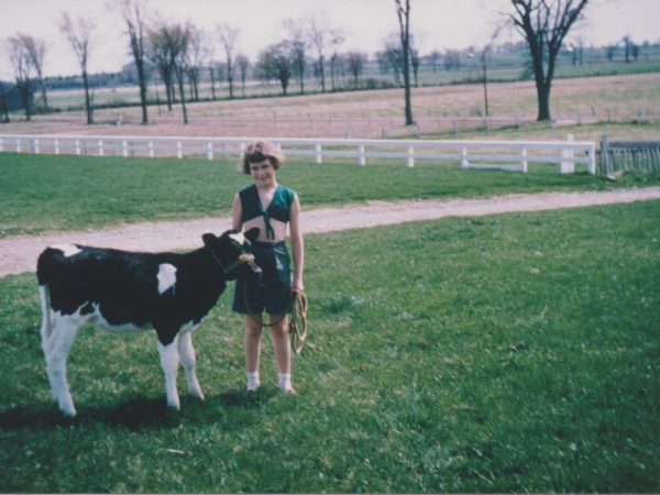 Marilyn Thompson training a calf for the 4-H in Lisbon