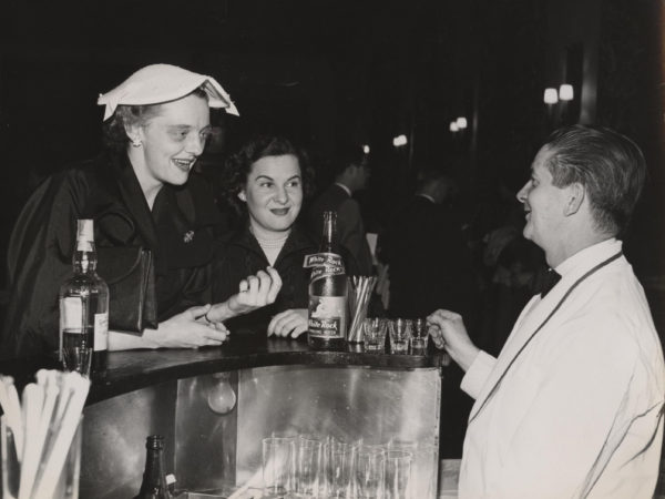 Two women at a bar in Saranac Lake