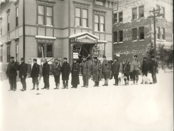 Adirondack guides posed outside Saranac Lake