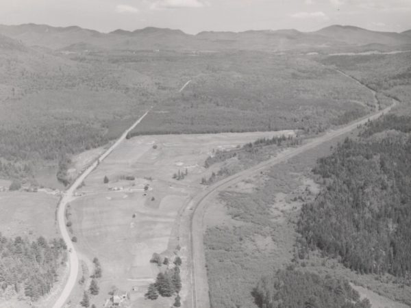 An aerial view of the railroad tracks between Lake Placid and Saranac Lake. Date unknown. Lake Placid and Saranac Lake, NY. Courtesy of the Saranac Lake Free Library.