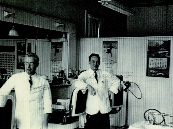 Father and son in Duclos Barbershop in Watertown