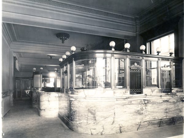 A teller inside the Jefferson County National Bank in Watertown