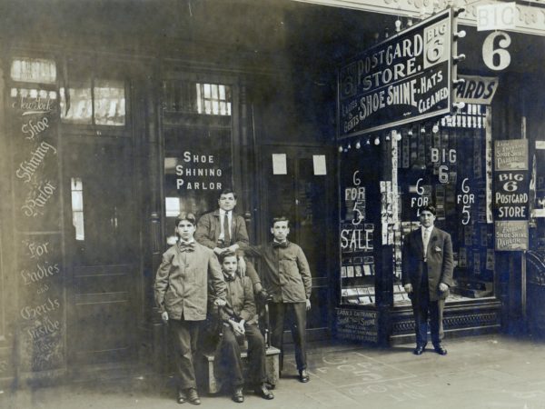 Boys working at a shoe shine shop in Watertown