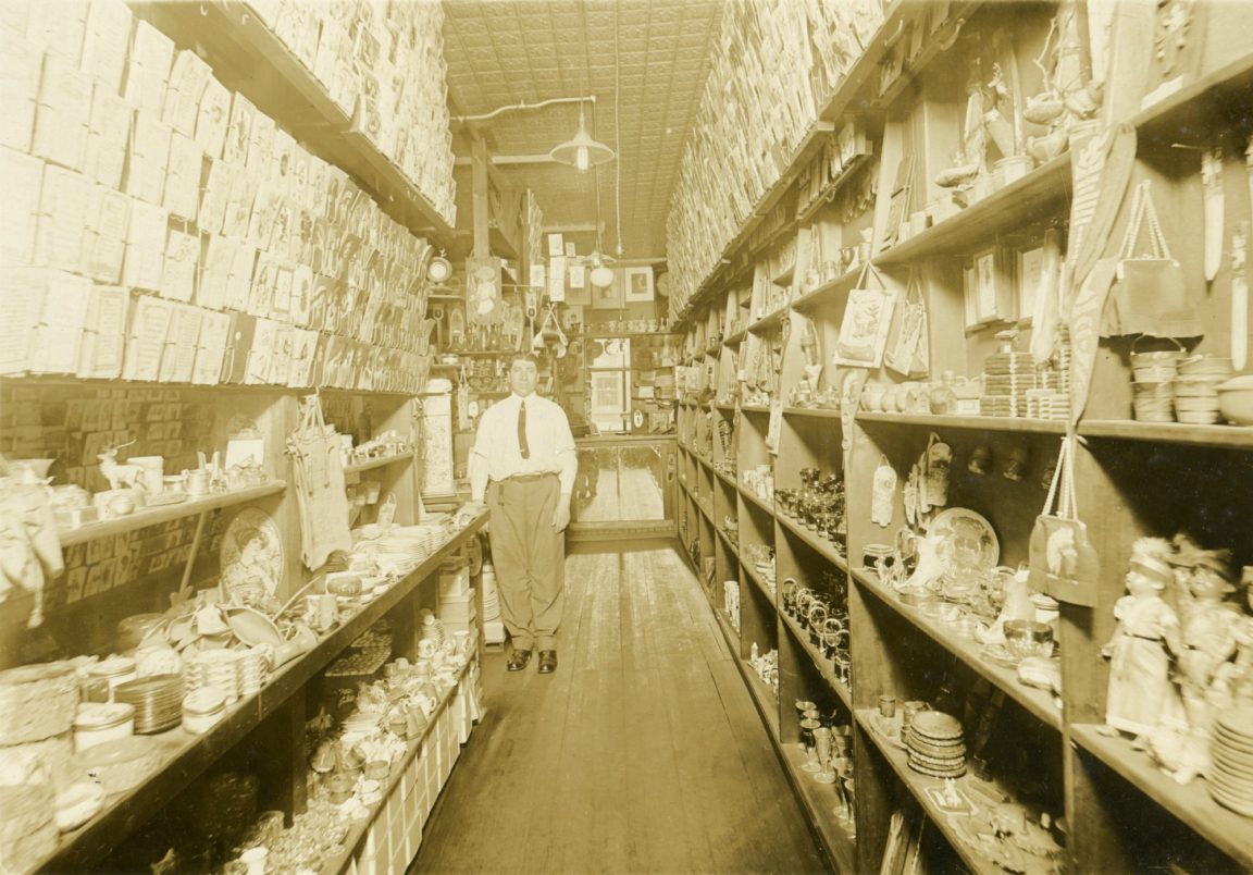 A man inside a stationery and notions store in Watertown