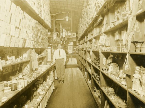 A man inside a stationery and notions store in Watertown