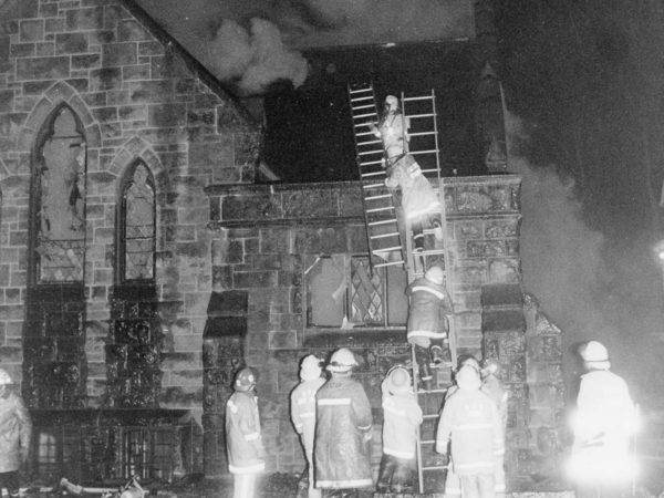 Firefighters at the All Souls Universalist Church in Watertown