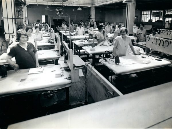 Women inside the Geo Sweetser & Son Shirt Factory in Watertown