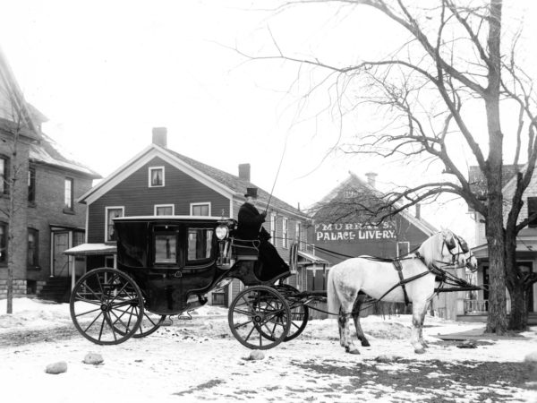 Horse-drawn carriage at Murray’s Palace Livery in Watertown