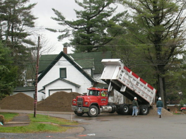 Installing a new drainage system for the sewer in Wanakena