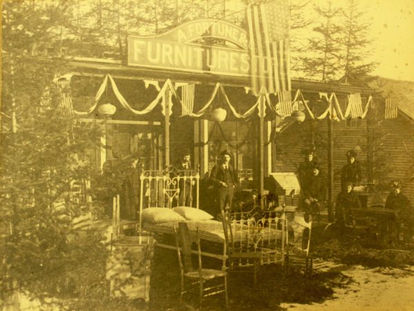 A. Fortune outside the Fortune Furniture Store in Saranac Lake