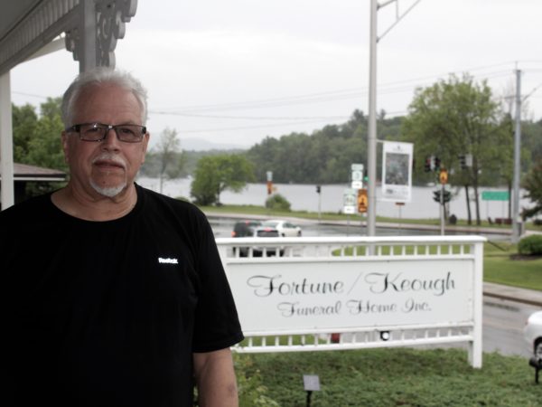 Andrew Fortune in front of the Fortune/Keough Funeral Home in Saranac Lake