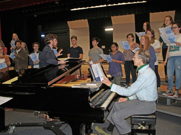 Drew Benware and accompanist Tom Delahant working with students in Saranac Lake