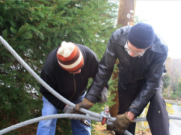 Stringing cable for the footbridge in Wanakena