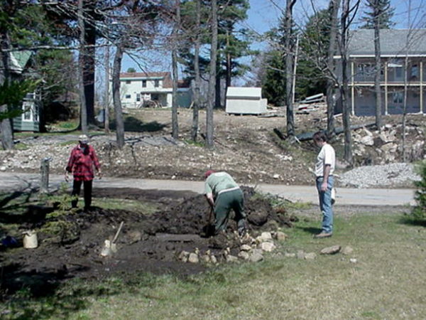 Fixing a break in the water system in Wanakena