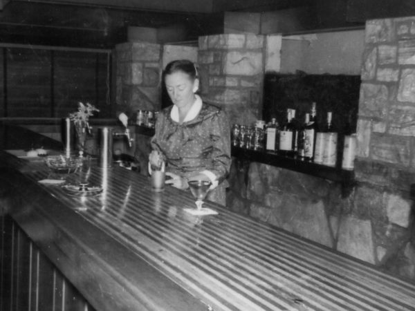 Ann O’Brien Martin bartending at Catamount Lodge in Colton