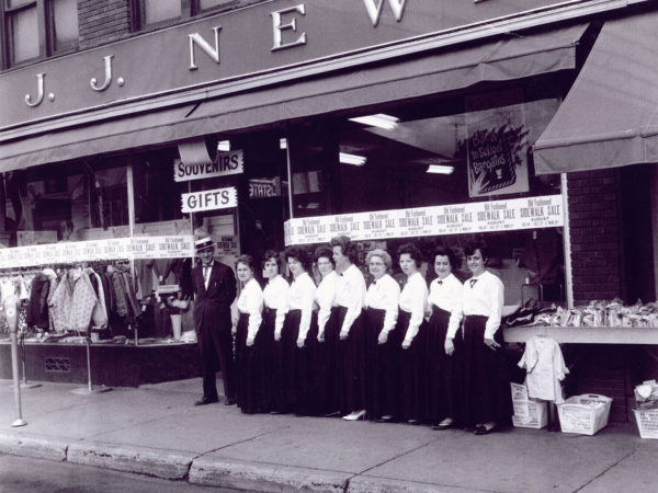 Employees in front of the J.J. Newberry department store in Tupper Lake