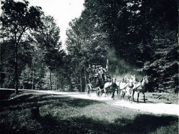 Stagecoach driving to the Saranac Inn on Upper Saranac Lake