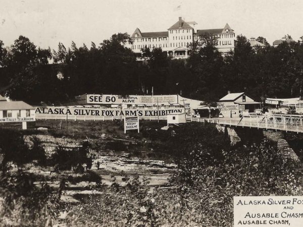 Exterior of the Alaska Silver Fox Farms with the Ausable Chasm Hotel in background