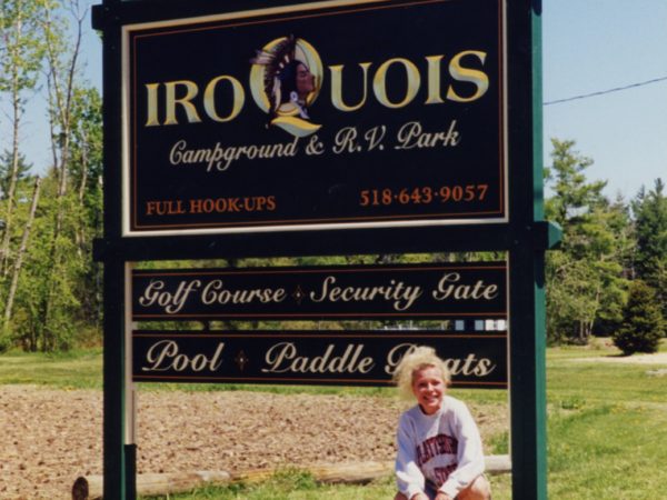 Sign-builder with the Iroquois Campground sign in Peru
