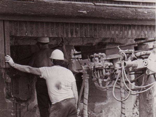 Moving Workers posed outside of the Potsdam Depot in Potsdam NY