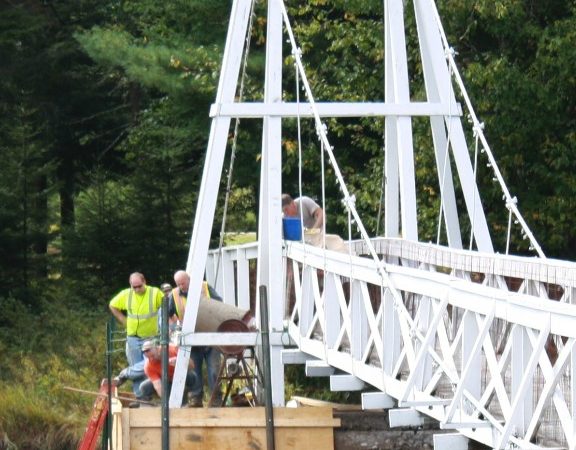 Repairing the cement footings of the old Wanakena footbridge