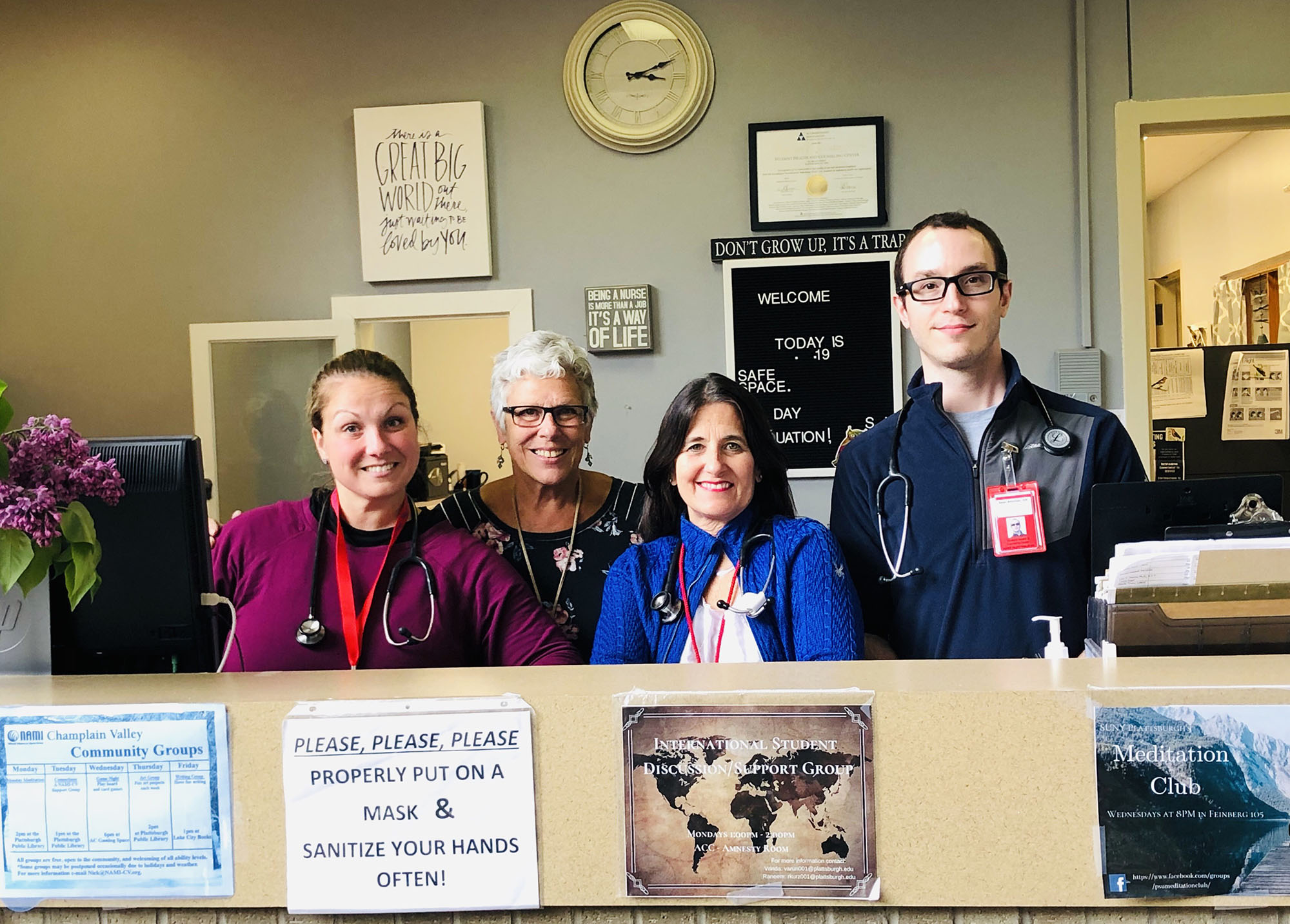 Dr. Kathleen Camelo poses with her staff in Plattsburgh