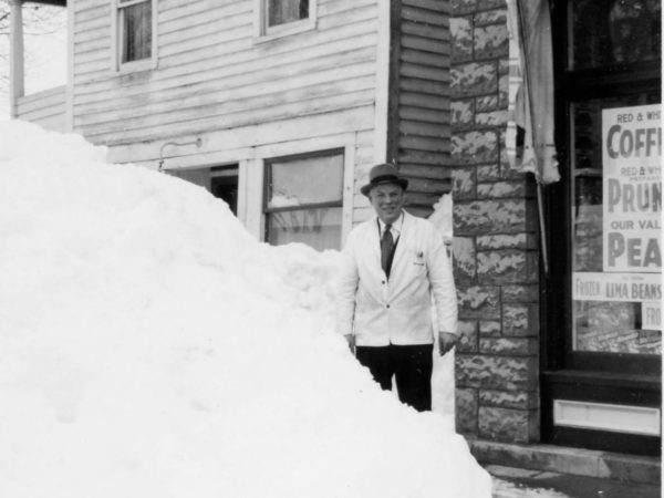 Giles Wallace outside the Red & White Store in Alexandria Bay