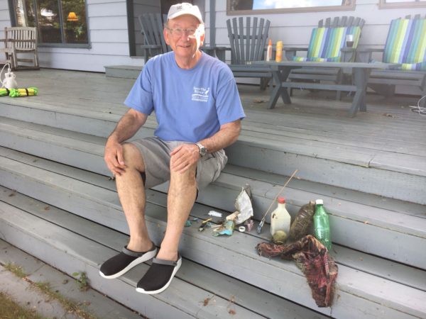 Save the River worker after cleaning up plastic in the St. Lawrence River