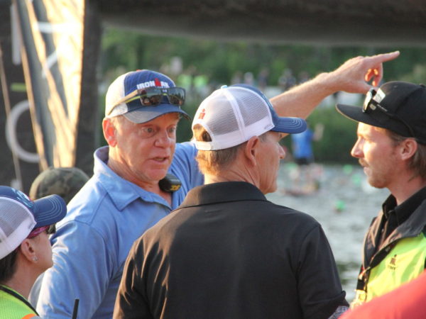 Ironman organizer Greg Borzilleri on Mirror Lake Beach in Lake Placid