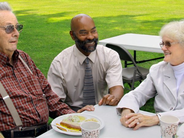 Reverend Fred Shaw at a church picnic in Elizabethtown