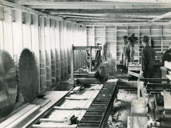 Workers inside the Triangle Lumber Company mill in Onchiota