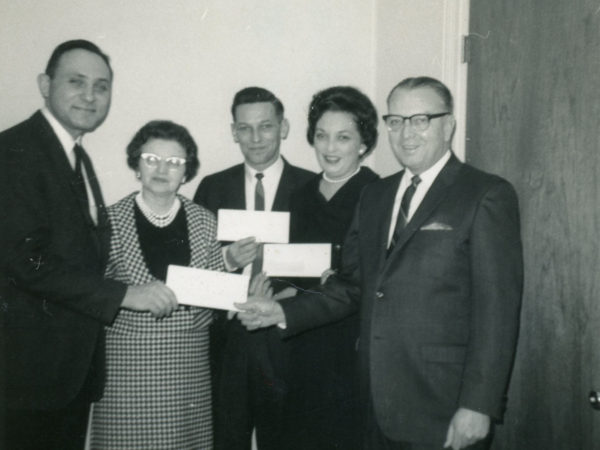 Patrick John Henry McKenty receiving an award at the Saranac Lake Savings and Loan