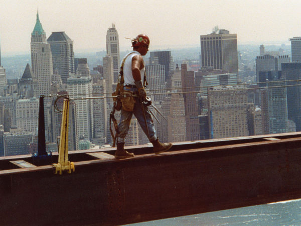 Darryl Lazore walking an iron beam