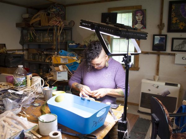 Carrie Hill working in her studio in Hogansburg