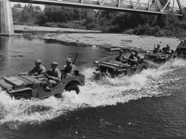 4th Armored Division crossing the Black River in jeeps at Pine Camp