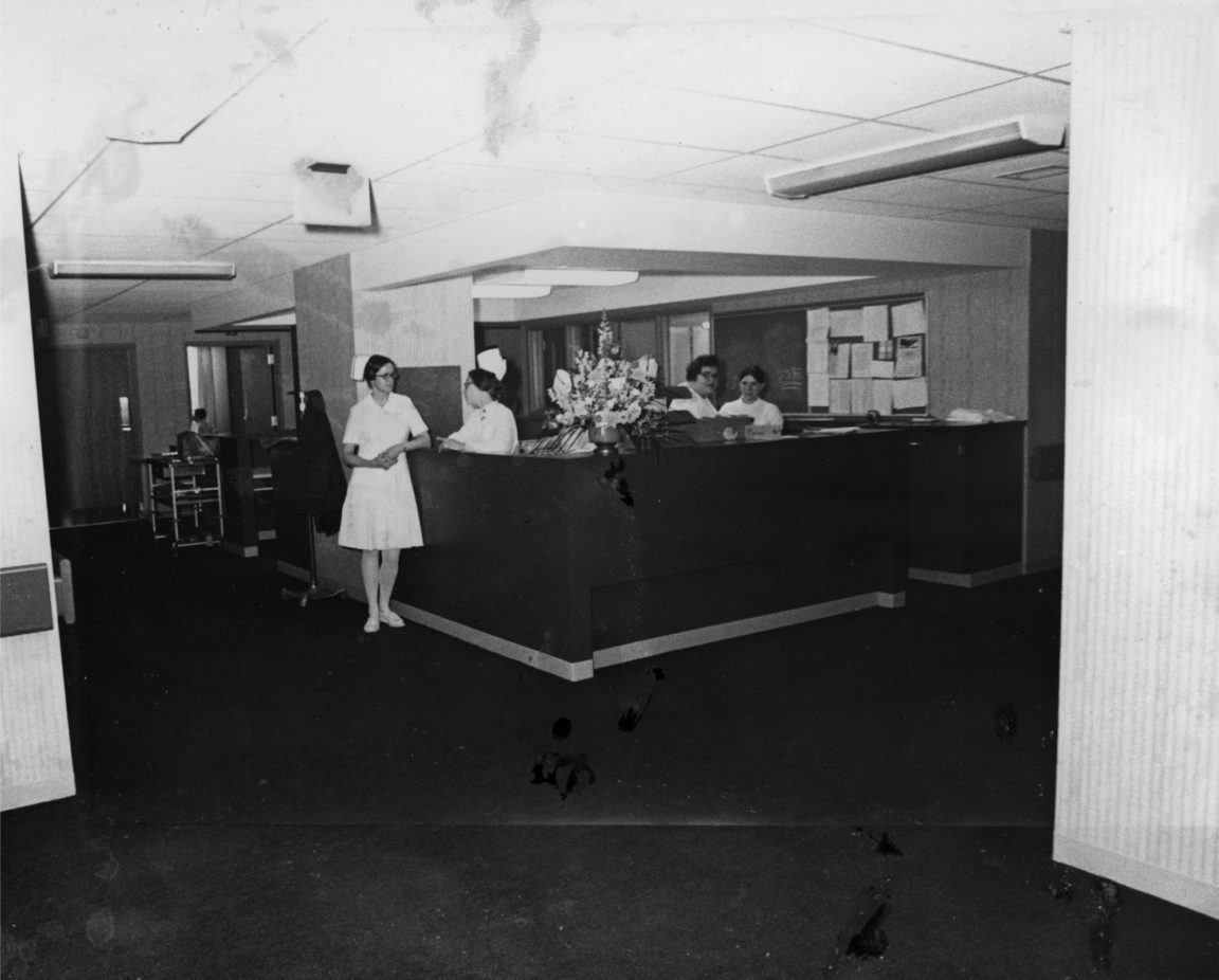 Nurses at station in Glens Falls Hospital in Glens Falls
