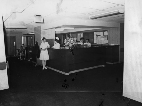 Nurses at station in Glens Falls Hospital in Glens Falls