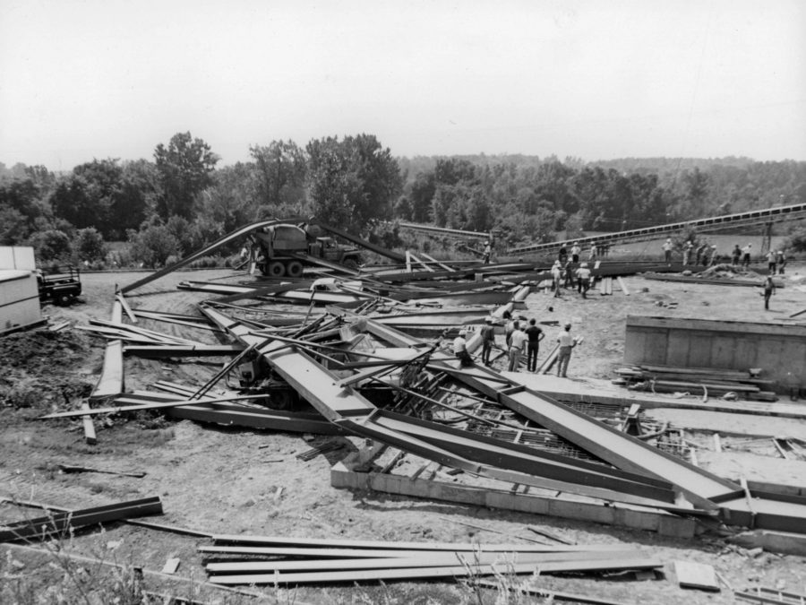 Men in suits at construction site of Potsdam Normal School in Potsdam