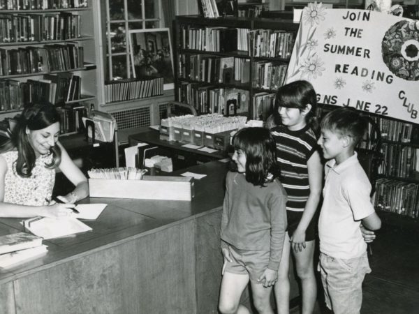 Agnes O’Brien assists patrons at Summer Reading program at Crandall Public Library in Glens Falls