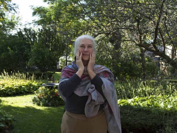 Delia Windwalker practicing healing touch in Watertown